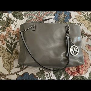 Gray Michael Kors tote.